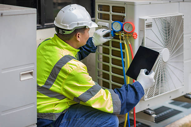 Professional Heat Pump Repair technician working in South Rockwood, MI